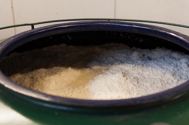 After steaming, the rice is let cool then mixed with Koji and Shochu. The mixture is kept in a tank for aging while occasionally being stirred by hands for three months. 